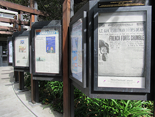 Newspaper front pages on display outside Moffitt Library