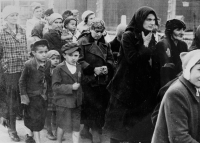 Hungarian Jewish women and children on the way to the gas chamber at Auschwitz.