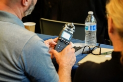 Man holding tape recorder