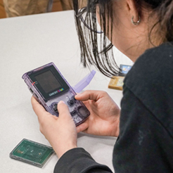 student plays on a GameBoy 