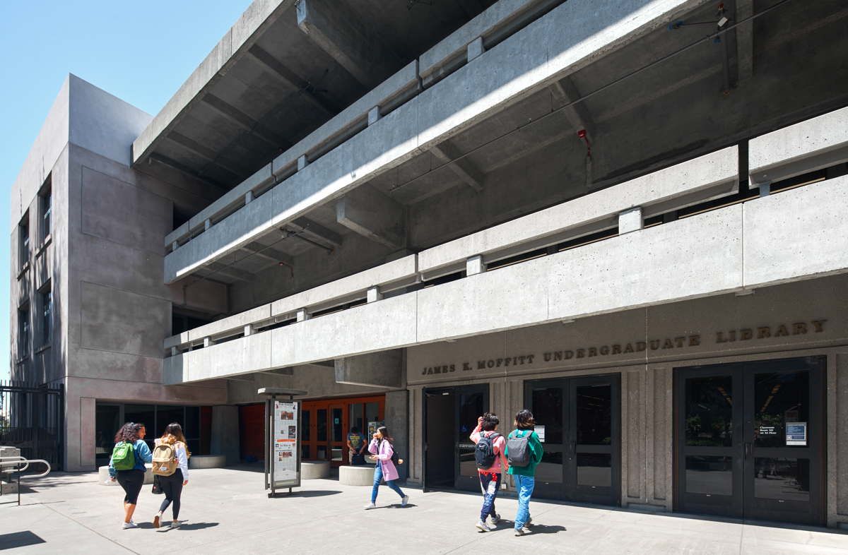 people walk outside moffitt library