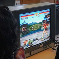 a martial arts video game is on a tv screen