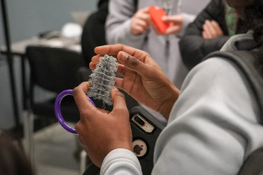 Student holds 3D printed object