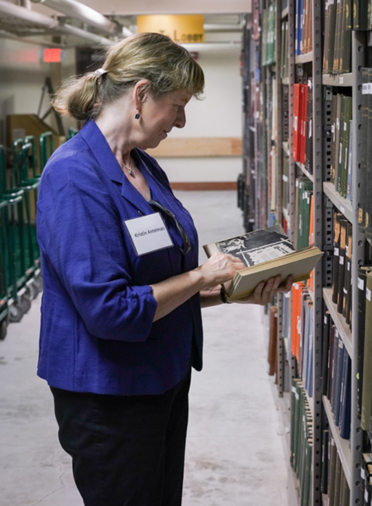 Visitor looks at a book