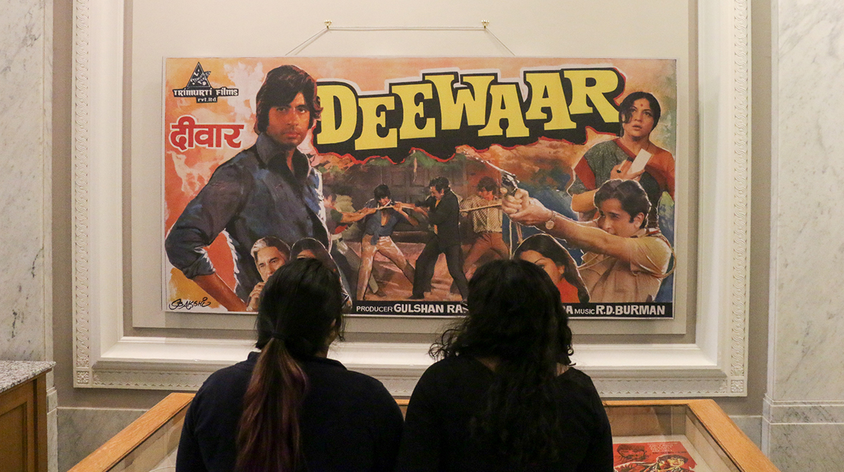 Students view the Love Across the Global South exhibit on opening night, Oct. 6, 2017. (Photo by Cade Johnson for the University Library)