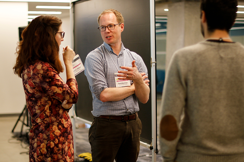 David Bamman, right, and Laura Nelson chat at the UnCamp on Thursday, Jan. 25, 2018. (Photo by J. Pierre Carrillo for the University Library)