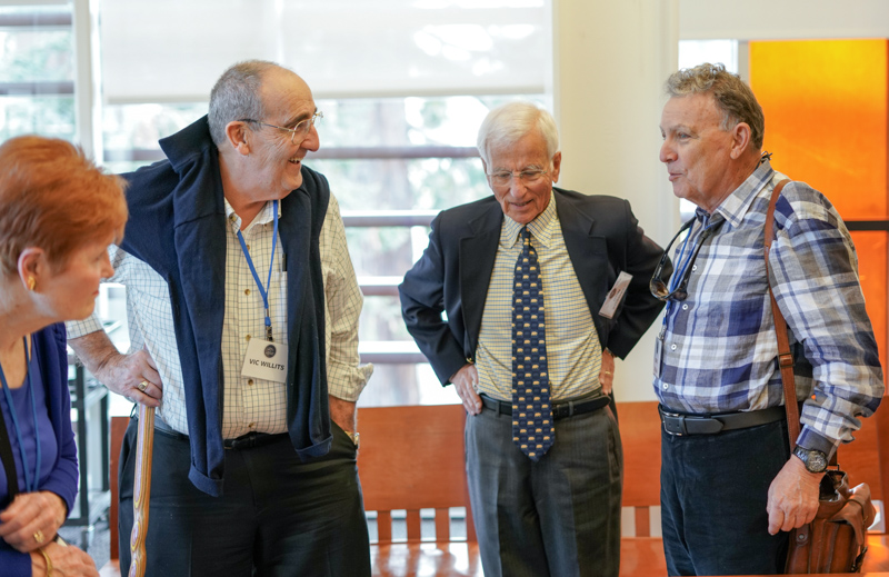 Left to right: Dr.​ ​Victor W. Willits ’62, Ed.D. ’68, Col.​ ​Don E. Kosovac ’58, ​and ​Mark W. Jordan J.D. ’66 chat at the event.