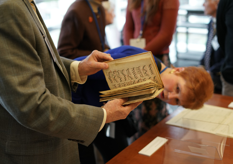 Donors view one of the Music Library’s rare collections at the luncheon.