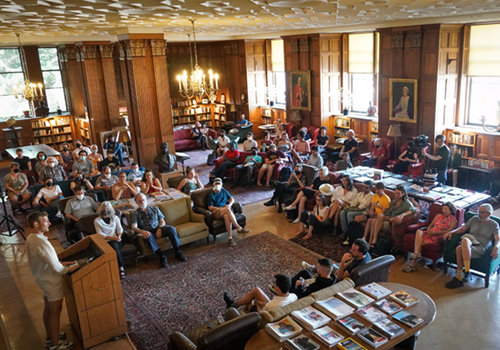 Morrison Library is full of patrons listening to Lunch Poems 