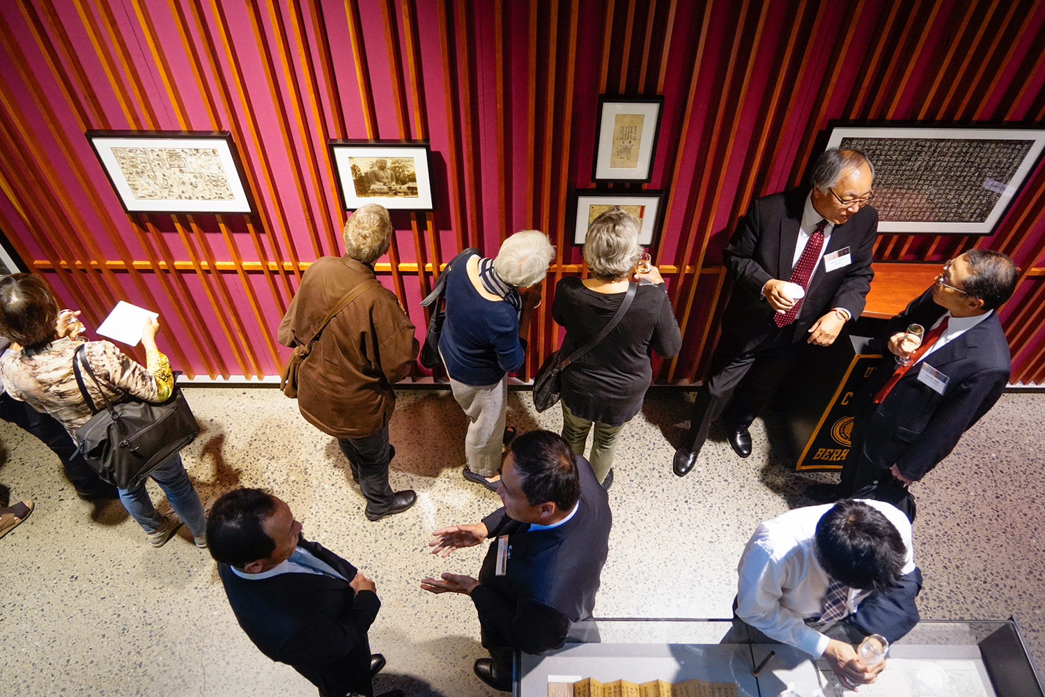 Guests look at collection items