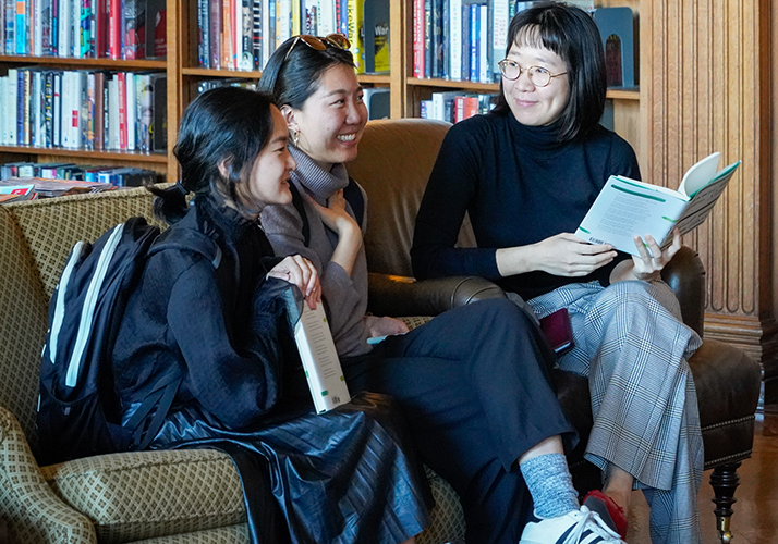 Guests chat after getting books signed