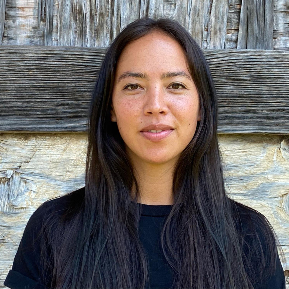 Claire Meuscheke looks at camera in portrait