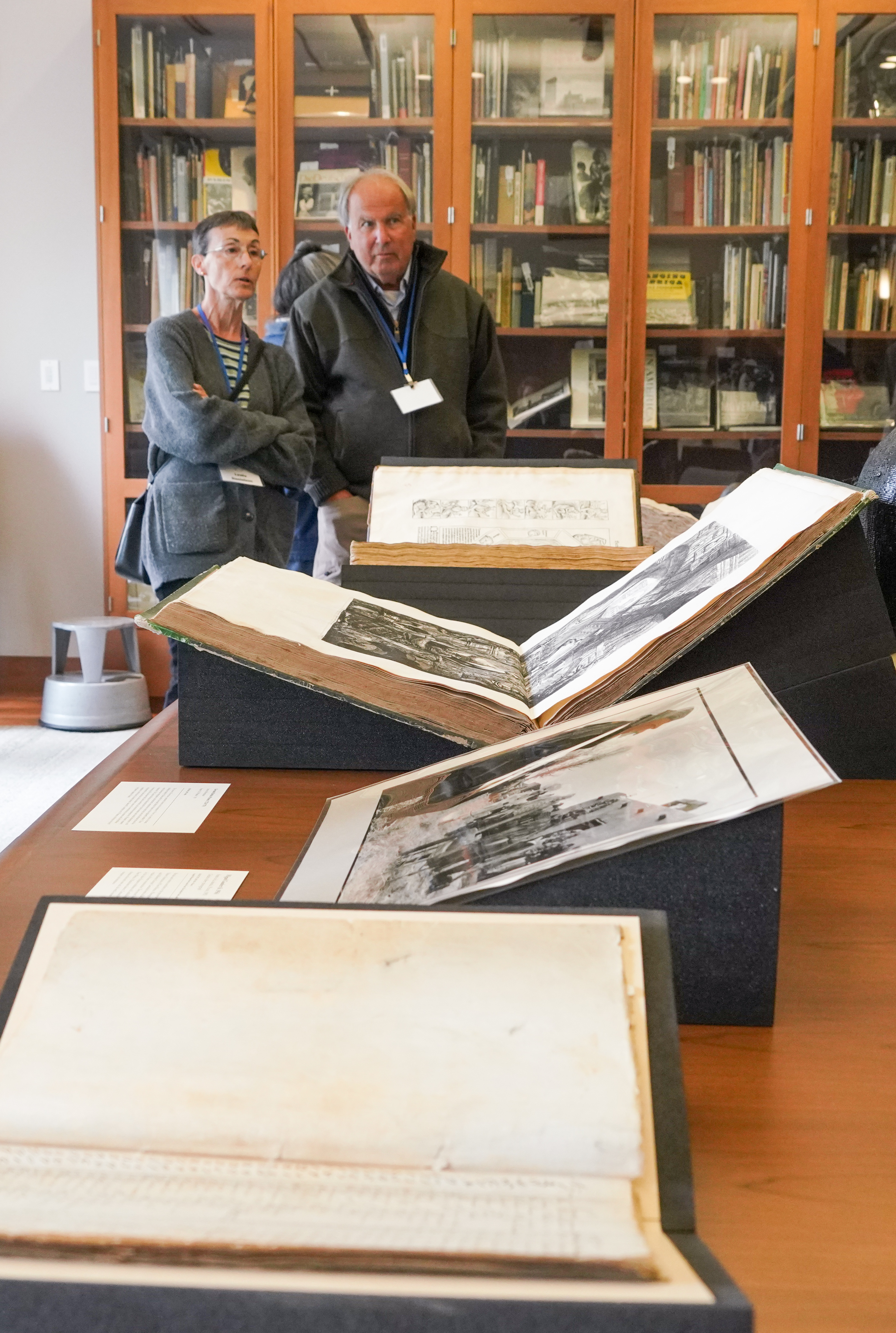 A couple looks over the items on display in the Bancroft Library